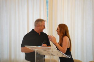 Veronica Garcia, bilingual master of ceremonies, hosting an event in Spain